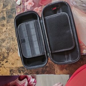 Black Travel Case with Red Accents